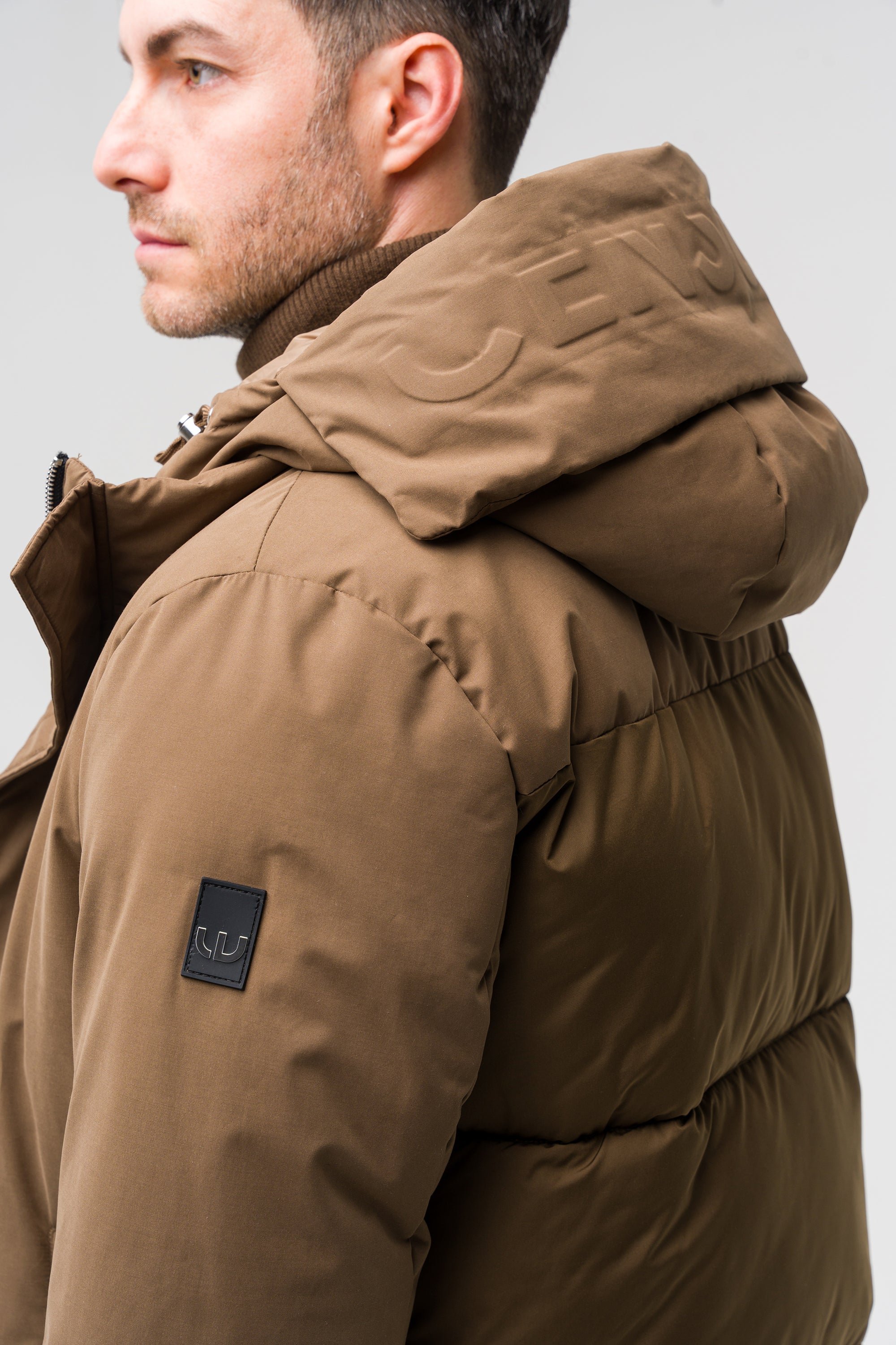 Short bi-material jacket with hood